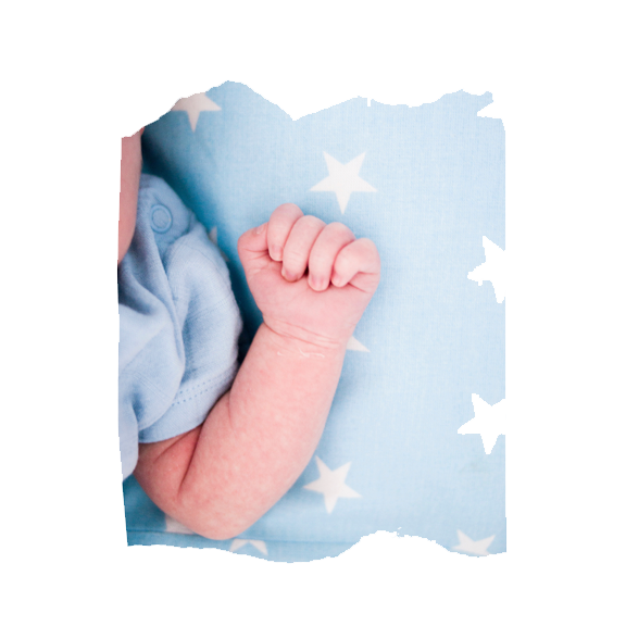 Baby's arm on a light blue field with starts.