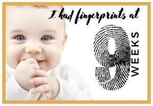 Baby's face. Text says I had fingerprints at 9 weeks.